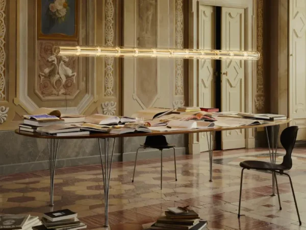 luce linear pendant over dining table